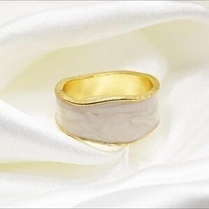 Elegant Gold and Cream Ring